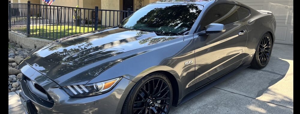 Grey Mustang GT with black wheels