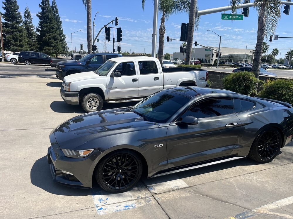 Grey Mustang GT with black wheels outside Car Pretty